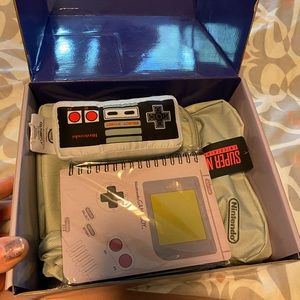 Super Nintendo backpack, Gameboy notebook and controller pillow